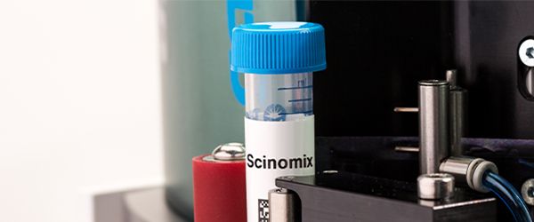 Semi-automated tube labeler